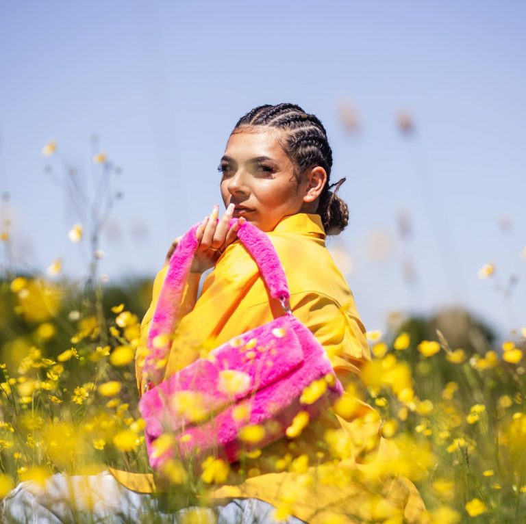 Niques the Artist in a Flower Field